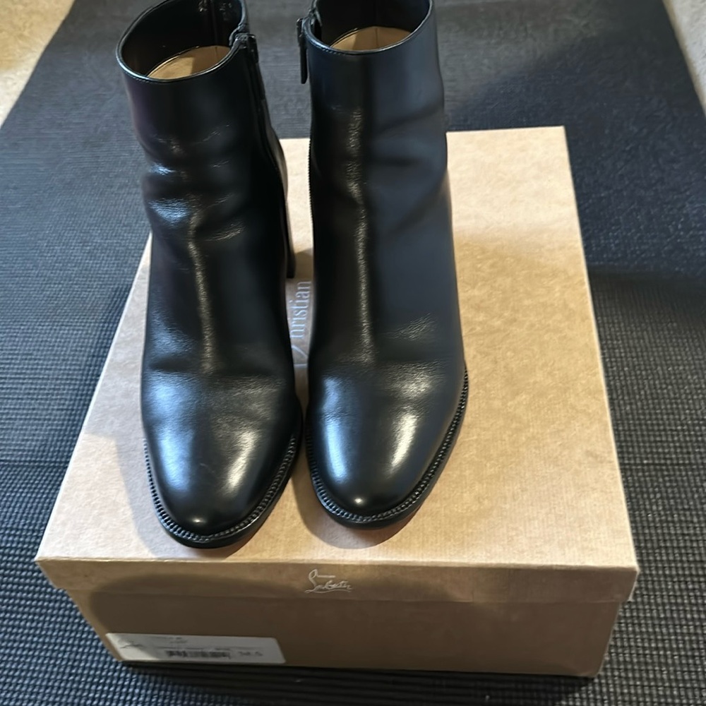 Christian Louboutin women’s black leather Adoxa boots